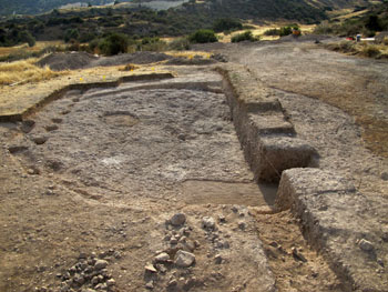 The communal building in Klimonas partially excavated